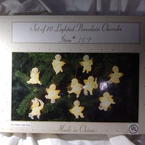 Set of 10 lighted Porcelain Cherbs Item # LCP